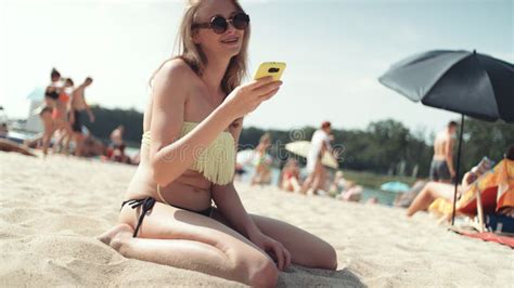 Pretty Woman In Bikini Talking On Phone At Beach Stock Photo Image