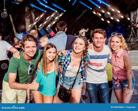 Teenagers At Summer Music Festival Having Fun Stock Photo Image Of