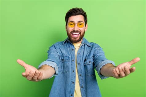 Photo Of Positive Excited Guy Dressed Jeans Shirt Open Arms Ready Hug You Empty Space Isolated