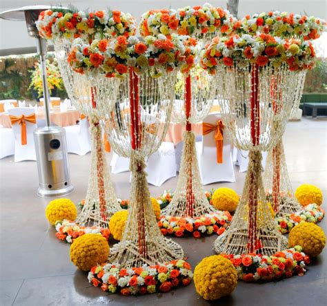 Photo Of Floral Arrangements At Indian Wedding