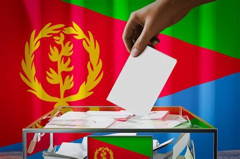 Premium Photo Eritrea Flag Hand Dropping Ballot Card Into A Box