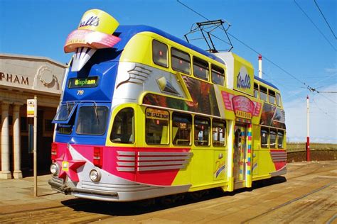 A Double Decker Bus Parked In Front Of A Building