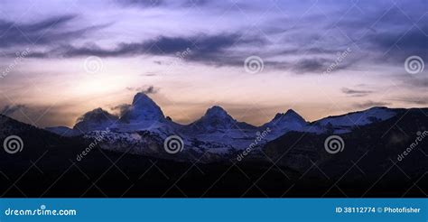 Sunrise Behind the Grand Teton Mountains Stock Photo - Image of beauty ...