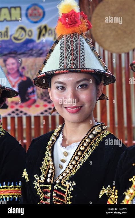 Smiling Kadazan Dusun girl in traditional costume Stock Photo - Alamy