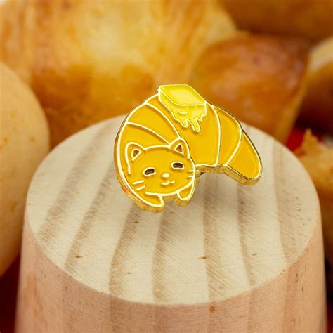 Purrsant The Cat Croissant Enamel Pin A Cute Pin Design For Cat Lovers