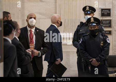 U.S. President Joe Biden walks with Assistant to the President and ...