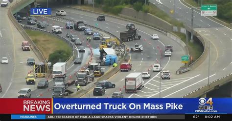 Overturned Tractor Trailer Causing Traffic Issues On Mass Pike In