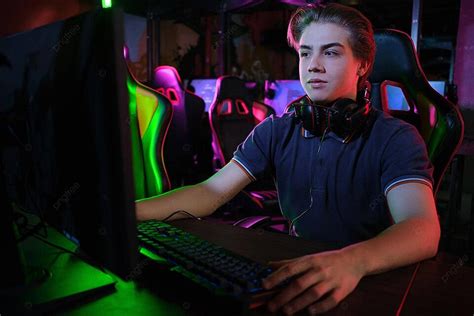 Professional Esport Player Engaged In Team Play And Training On Pc