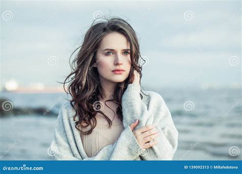 Portrait Of Young Beauty Woman With Long Brown Hair Outdoor Romantic