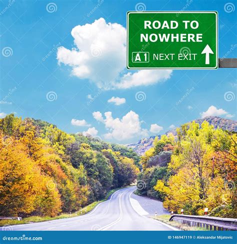 ROAD TO NOWHERE Road Sign Against Clear Blue Sky Stock Image - Image of ...