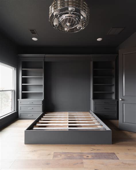 Stunning Black Painted Master Bedroom With Custom Built In Platform Bed With Built In Shelving