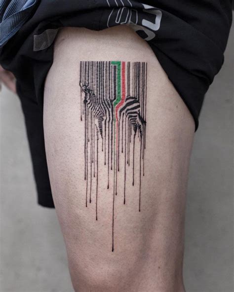 Abstract Leaking Barcode And Zebra Tattoo On The Left Thigh Zebra