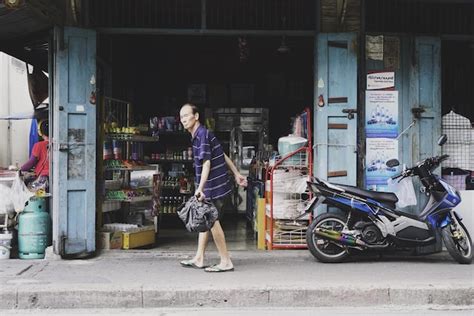 Premium Photo Full Length Of Mid Adult Man Holding Garbage Bag