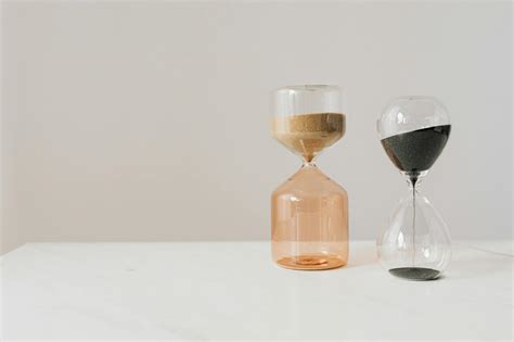 Stylish various sand hourglasses placed on table · Free Stock Photo