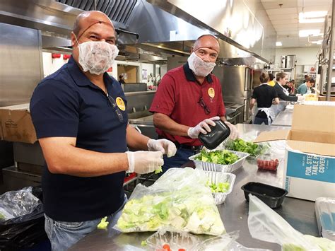 San Antonio Employees Volunteer At Local Food Bank Defense Contract