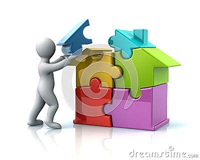 Man Builds A Puzzle House Royalty Free Stock Photography