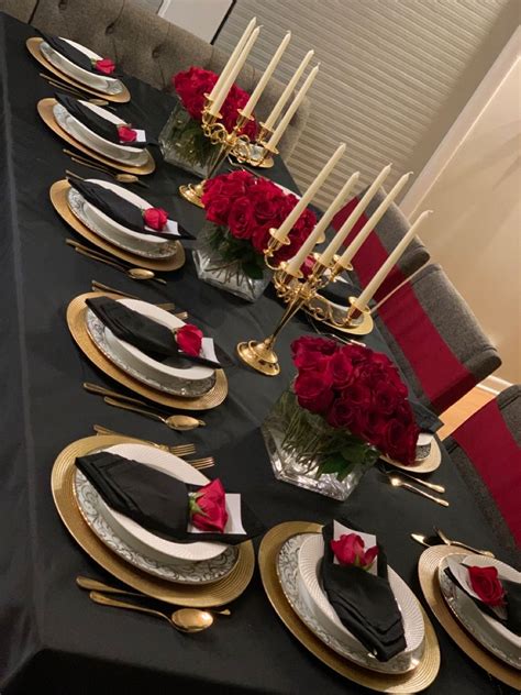 Elegant Black, Red, and Gold Table Setting