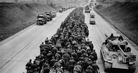 German Prisoners March Along Highway | HistoryNet