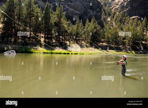 11 Year Old Girl Fly Fishing In River Near Bend Oregon Stock Photo Alamy