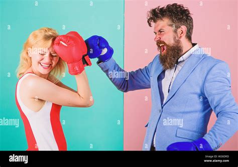 Female And Male Boxers Fighting In Gloves Domination Concept Gender