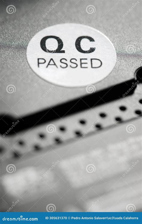 QC Passed Sticker on an Electronic Device Stock Photo - Image of ...