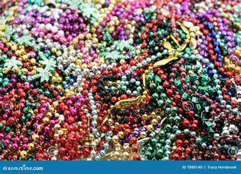 Pile of mardi gras beads stock photo. Image of jewelry - 7888140