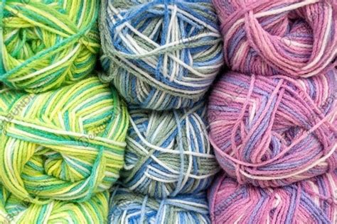 multi colored variegated yarn skeins background