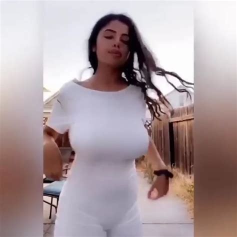 Woman Pressing Her Clothed Fully Covered Boobs Together Using Her Arms Also With Slo Mo R