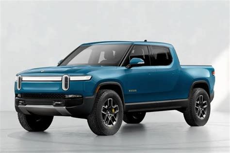 Rivian Rolls First Production R T Electric Pickup Truck Off The Line