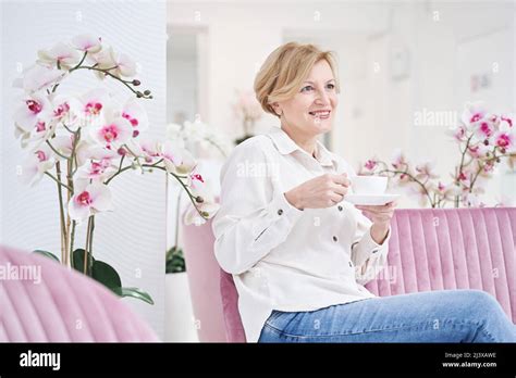 Cute Mature Blonde Woman Enjoying Aroma Coffee Stock Photo Alamy