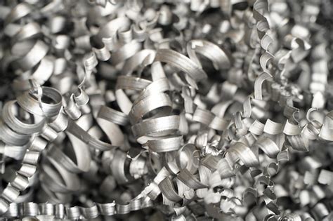 Premium Photo | Steel scrap materials recycling aluminum chip waste ...