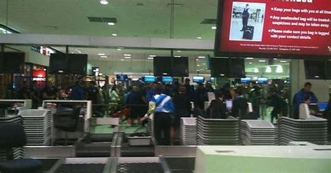 Canterbury Bulldogs players checking in to their flight to New Zealand ...