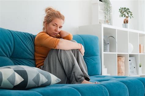 Premium Photo Unhappy Woman Depressed Touching Hair Sitting On Floor