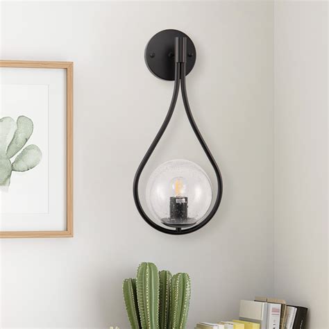 Everly Quinn Bakkedahl Light Wrought Iron Armed Sconce With Frosted