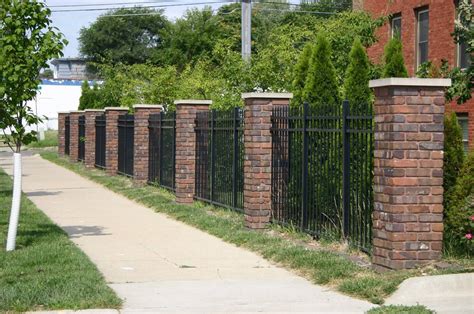 Brick And Iron Fence