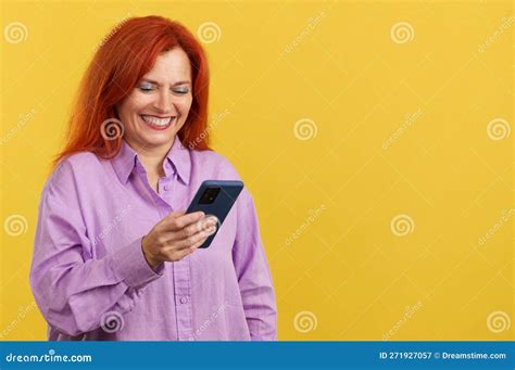 Happy Mature Redheaded Woman Smiling While Using The Mobile Stock Image Image Of Smart Woman