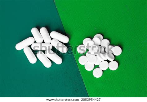 Two Forms Medicinal Tablets Handful Oval Stock Photo 2053954427