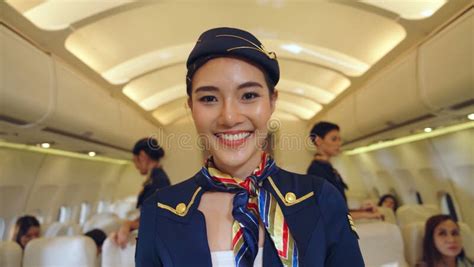 Cabin Crew Or Air Hostess Working In Airplane Stock Image Image Of