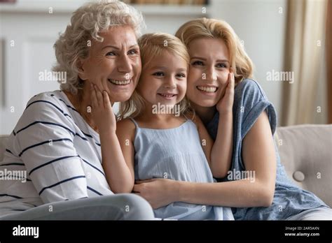 Three Generation Women Bonding Enjoying Spending Time Together Stock