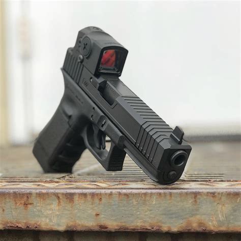 Aimpoint ACRO P-1 pistol mounted red dot. New Pics - AR15.COM