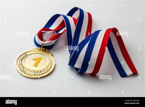 Gold medal. First place award with ribbon Stock Photo - Alamy