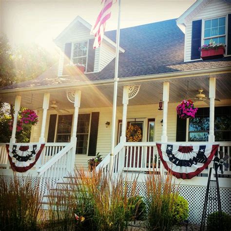 Patriotic Bunting Flags On Front Porch Of Capecod Patriotic Bunting