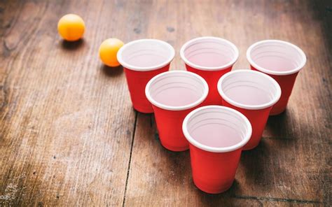 Premium Photo Beer Pong Plastic Red Color Cups And Ping Pong Balls On