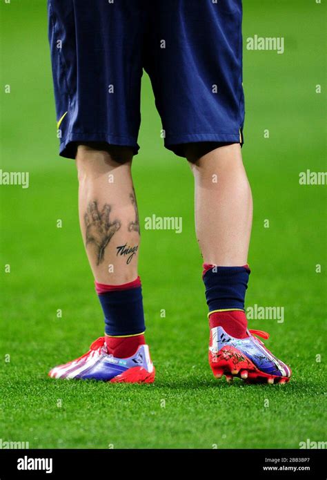 Detail view of a tattoo on the leg of Barcelona's Lionel Messi Stock Photo - Alamy