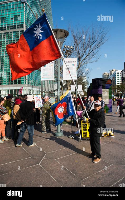 A Taiwanese nationalist holding the flag of Taiwan / ROC Stock Photo ...