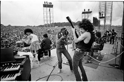 Iconic Santana Performing On Woodstock 1969 Photocred To Jim Marshall