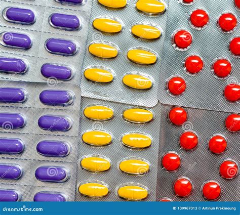 Pile Of Colorful Tablet Pills In Blister Packs Global Healthcare