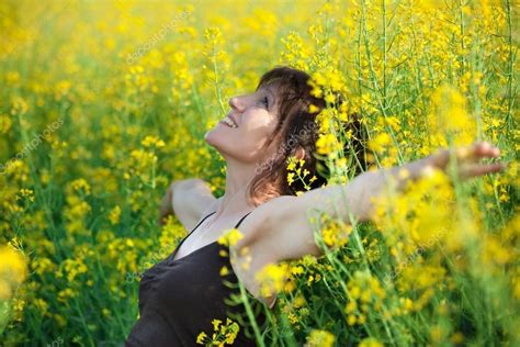 Woman Lying In Flowers Stock Photo By Smithore 13372762