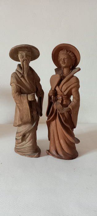 2 terracotta statues - 27 cm (2) - Ceramic - Catawiki