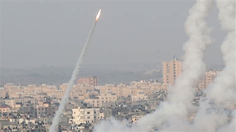 '22 killed' in Gaza Strip air strikes after Hamas fires rockets towards ...